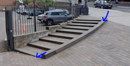 Curved ramp next to stairs